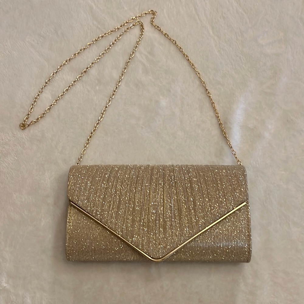 Gold glitter clutch bag‎